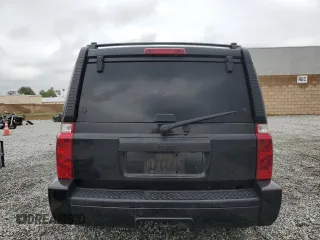 2006 Jeep Commander z VIN 1J8HH48K86C289122, wystawiony jako Copart lot #55810935 z przebiegiem 140 063 mil mil oraz Szkoda całkowita • Salvage title. Historia ofert i sprzedaży dostępna na DreamBid. Obrazek 6.