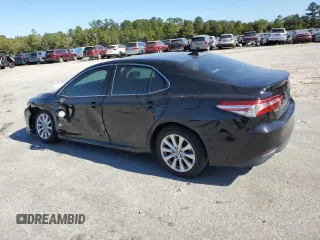 2020 Toyota Camry LE with VIN 4T1L11AK6LU999376, listed as a Copart auction lot 74192794 with 81,396 mi miles and Salvage Title. Bid and sale history available at carsss.com. Image 2.