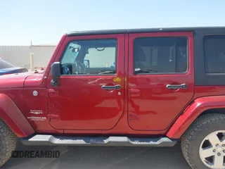 2012 Jeep Wrangler Unlimited Sahara with VIN 1C4BJWEG2CL209600, listed as a IAAI auction lot 42015290 with 133,229 mi miles and . Bid and sale history available at DreamBid. Image 14.