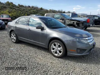 2012 Ford Fusion SE with VIN 3FAHP0HG6CR366507, listed as a Copart auction lot 54118815 with 136,406 mi miles and Salvage title. Bid and sale history available at DreamBid. Image 4.