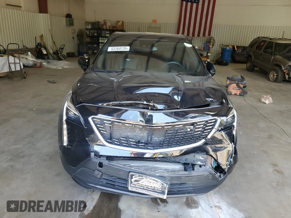 2022 Cadillac XT4 FWD Luxury z VIN 1GYAZAR45NF124737, wystawiony jako Copart lot #53164135 z przebiegiem 41 344 mil mil oraz Szkoda całkowita • Salvage title. Historia ofert i sprzedaży dostępna na DreamBid. Obrazek 5.