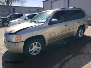 2006 GMC Envoy SLT with VIN 1GKDT13S662127817, listed as a Copart auction lot 50837674 with 165,398 mi miles and Salvage Title. Bid and sale history available at carsss.com. Image 1.