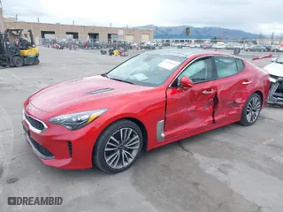 2019 Kia Stinger with VIN KNAE15LA7K6063792, listed as a IAAI auction lot 41490932 with 19,806 mi miles. Bid and sale history available at carsss.com. Image 2.