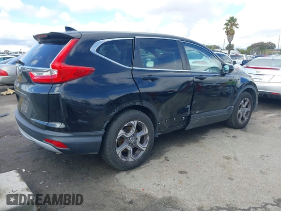2017 Honda CR-V EX with VIN 7FARW1H55HE009693, listed as a IAAI auction lot 41539260 with 136,645 mi miles. Bid and sale history available at carsss.com. Image 4.
