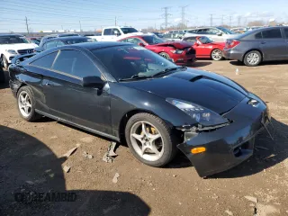 2000 Toyota Celica GTS with VIN JTDDY32T2Y0007501, listed as a Copart auction lot 51665445 with 195,920 mi miles and Salvage Title. Bid and sale history available at DreamBid. Image 4.