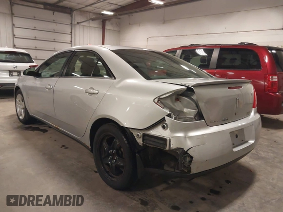 2009 Pontiac G6 w/1SA *Ltd Avail* with VIN 1G2ZG57B094155004, listed as a IAAI auction lot 41925584 with 123,169 mi miles. Bid and sale history available at carsss.com. Image 3.