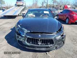 2014 Maserati Ghibli S Q4 z VIN ZAM57RTA9E1089297, wystawiony jako IAAI lot #41687559 z przebiegiem 64 627 mil mil oraz . Historia ofert i sprzedaży dostępna na DreamBid. Obrazek 12.