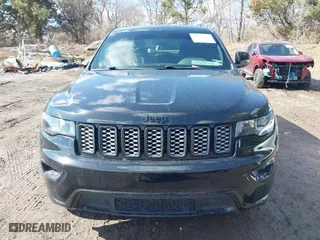 2018 Jeep Grand Cherokee Laredo E with VIN 1C4RJFAG8JC453706, listed as a IAAI auction lot 41688655 with 116,965 mi miles. Bid and sale history available at carsss.com. Image 13.