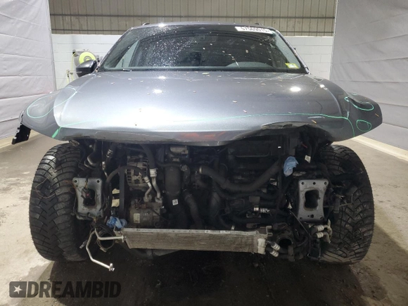 2022 Volkswagen Tiguan SE R-Line Black with VIN 3VV8B7AX6NM026562, listed as a Copart auction lot 57569015 with 115,478 mi miles and Salvage title. Bid and sale history available at DreamBid. Image 5.