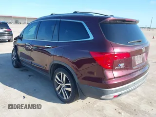 2017 Honda Pilot Touring with VIN 5FNYF5H96HB038413, listed as a IAAI auction lot 42594065 with 130,501 mi miles and . Bid and sale history available at DreamBid. Image 3.