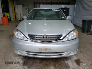 2003 Toyota Camry LE with VIN 4T1BE32K33U710903, listed as a Copart auction lot 56976585 with 157,444 mi miles and Clean Title. Bid and sale history available at DreamBid. Image 5.