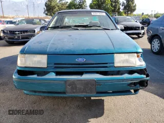 1993 Ford Tempo GL z VIN 2FAPP36X2PB168916, wystawiony jako Copart lot #63911044 z przebiegiem 30 114 mil mil oraz Tytuł czysty. Historia ofert i sprzedaży dostępna na DreamBid. Obrazek 5.