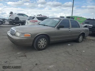 2005 Ford Crown Victoria LX with VIN 2FAFP74W95X147431, listed as a Copart auction lot 73487374 with 203,107 mi miles and Non Repairable. Bid and sale history available at carsss.com. Image 1.