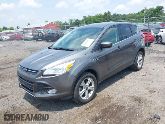 2014 Ford Escape SE with VIN 1FMCU9GX1EUE21729, listed as a IAAI auction lot 42475113 with 116,050 mi miles and . Bid and sale history available at DreamBid. Image 2.