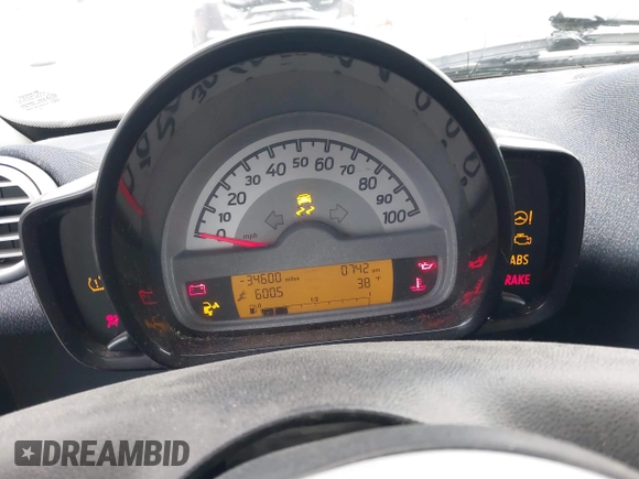 2013 Smart fortwo Pure with VIN WMEEJ3BA2DK702004, listed as a IAAI auction lot 41829808 with 53,545 mi miles and . Bid and sale history available at DreamBid. Image 7.