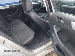 2012 Volkswagen Jetta TDI w/Premium & Nav with VIN 3VWLL7AJ8CM364248, listed as a IAAI auction lot 42292490 with 268,674 mi miles and . Bid and sale history available at DreamBid. Image 8.