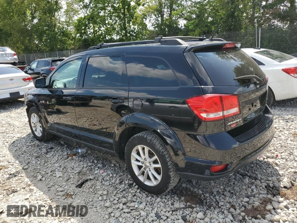 2015 Dodge Journey SXT with VIN 3C4PDCCG4FT697505, listed as a Copart auction lot 64888554 with 191,653 mi miles and Salvage title. Bid and sale history available at DreamBid. Image 2.