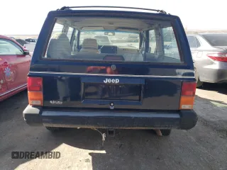 1994 Jeep Cherokee SE with VIN 1J4FJ28S7RL175098, listed as a Copart auction lot 44138405 with 108,558 mi miles and Salvage Title. Bid and sale history available at carsss.com. Image 6.