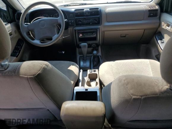 2000 Isuzu Rodeo S with VIN 4S2DM58WXY4302769, listed as a Copart auction lot 70416054 with 150,621 mi miles and Salvage Title. Bid and sale history available at DreamBid. Image 8.