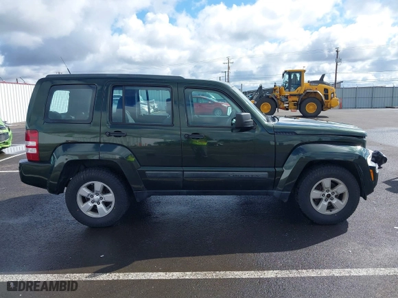 2011 Jeep Liberty Sport with VIN 1J4PN2GK9BW552545, listed as a IAAI auction lot 41815352 with 148,993 mi miles. Bid and sale history available at carsss.com. Image 13.