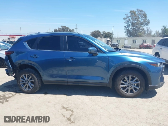 2023 Mazda CX-5 S Select with VIN JM3KFBBM3P0208376, listed as a IAAI auction lot 42023207 with 20,114 mi miles and . Bid and sale history available at carsss.com. Image 14.
