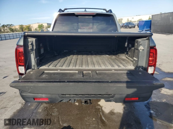 2018 Honda Ridgeline RTL-E с VIN 5FPYK3F74JB009474, выставлен на аукционе Copart как лот 49156615 с пробегом 121 045 миль миль и Списание • Salvage title. История ставок и продаж доступна на DreamBid. Изображение 6.