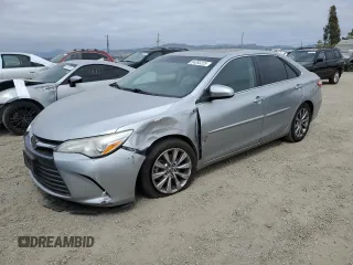 2015 Toyota Camry LE z VIN 4T1BD1FKXFU151730, wystawiony jako Copart lot #54393225 z przebiegiem 219 892 mil mil oraz Szkoda całkowita • Salvage title. Historia ofert i sprzedaży dostępna na DreamBid. Obrazek 1.