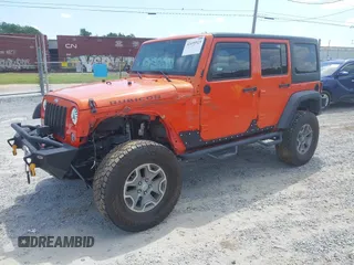 2015 Jeep Wrangler Unlimited Rubicon z VIN 1C4BJWFG4FL598033, wystawiony jako IAAI lot #42435523 z przebiegiem 134 202 mil mil oraz . Historia ofert i sprzedaży dostępna na DreamBid. Obrazek 2.