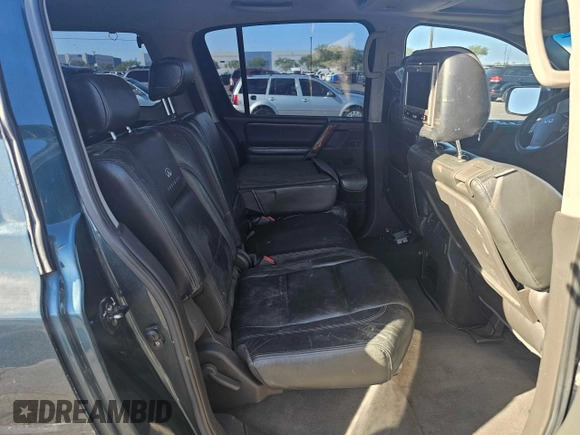 2004 Infiniti QX56 with VIN 5N3AA08A64N812493, listed as a Copart auction lot 77486754 with 0 mi miles and Salvage Title. Bid and sale history available at carsss.com. Image 6.