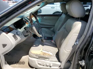2010 Cadillac DTS 1SD z VIN 1G6KH5EY5AU110844, wystawiony jako Copart lot #57141785 z przebiegiem 173 657 mil mil oraz Tytuł czysty. Historia ofert i sprzedaży dostępna na DreamBid. Obrazek 7.