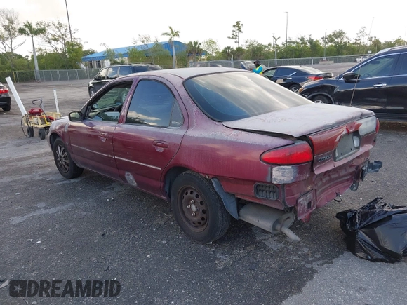 1999 Ford Contour SE z VIN 1FAFP6635XK169090, wystawiony jako IAAI lot #42198696 z przebiegiem 114 933 mil mil oraz . Historia ofert i sprzedaży dostępna na DreamBid. Obrazek 3.