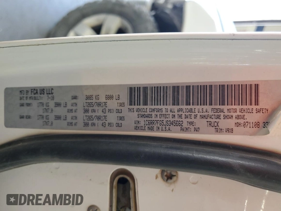 2018 Ram 1500 Express with VIN 1C6RR7FG5JS345662, listed as a Copart auction lot 60254455 with 84,384 mi miles and Salvage title. Bid and sale history available at DreamBid. Image 12.
