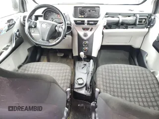 2012 Scion iQ with VIN JTNJJXB07CJ017816, listed as a Copart auction lot 59616355 with 141,384 mi miles and Salvage title. Bid and sale history available at DreamBid. Image 8.