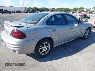 2000 Pontiac Grand Am SE with VIN 1G2NE52T8YM712695, listed as a IAAI auction lot 41855853 with 63,914 mi miles. Bid and sale history available at carsss.com. Image 4.