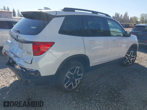 2023 Honda Passport Elite with VIN 5FNYF8H01PB004087, listed as a IAAI auction lot 42045433 with 20,677 mi miles and . Bid and sale history available at DreamBid. Image 4.