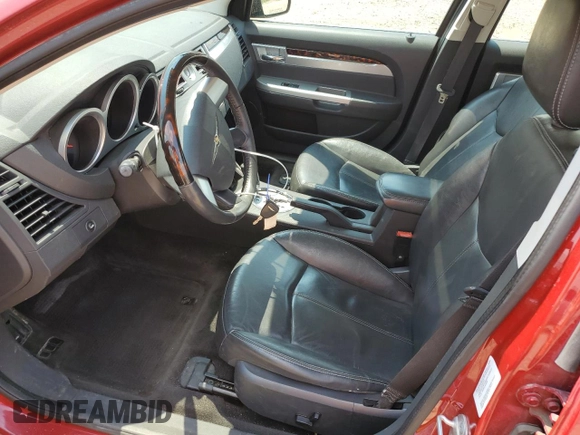 2010 Chrysler Sebring Limited with VIN 1C3CC5FD1AN197099, listed as a Copart auction lot 59128825 with 85,736 mi miles and Salvage title. Bid and sale history available at DreamBid. Image 7.
