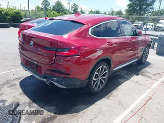 2021 BMW X4 xDrive30i with VIN 5UX2V1C07M9F59530, listed as a IAAI auction lot 42484957 with Not provided miles and . Bid and sale history available at DreamBid. Image 4.