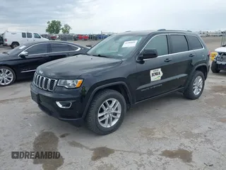 2018 Jeep Grand Cherokee Laredo E with VIN 1C4RJFAG6JC335606, listed as a IAAI auction lot 42280666 with 113,438 mi miles and . Bid and sale history available at DreamBid. Image 17.