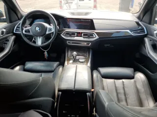 2019 BMW X5 xDrive40i with VIN 5UXCR6C57KLL11051, listed as a Copart auction lot 60268695 with 169,671 mi miles and Salvage title. Bid and sale history available at DreamBid. Image 8.