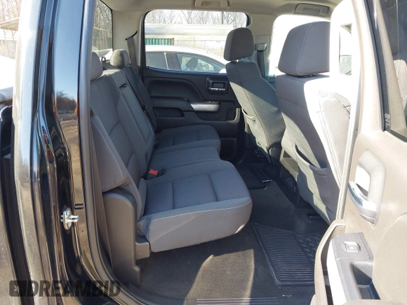 2018 Chevrolet Silverado 1500 LT with VIN 1GCUKREC3JF119906, listed as a IAAI auction lot 41765398 with 122,472 mi miles and . Bid and sale history available at DreamBid. Image 8.