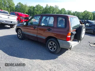 2000 Chevrolet Tracker z VIN 2CNBJ13C3Y6917675, wystawiony jako IAAI lot #42281654 z przebiegiem 153 805 mil mil oraz . Historia ofert i sprzedaży dostępna na DreamBid. Obrazek 3.