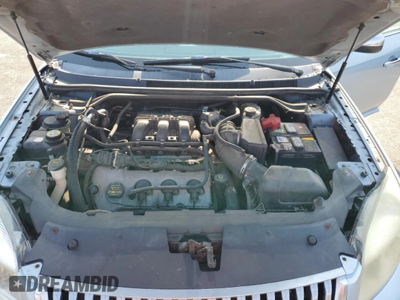 2008 Mercury Sable Premier z VIN 1MEHM43W68G619346, wystawiony jako Copart lot #60102945 z przebiegiem 167 305 mil mil oraz Szkoda całkowita • Salvage title. Historia ofert i sprzedaży dostępna na DreamBid. Obrazek 11.