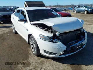 2014 Ford Taurus Limited with VIN 1FAHP2F89EG155934, listed as a IAAI auction lot 41760703 with 130,280 mi miles. Bid and sale history available at carsss.com. Image 1.
