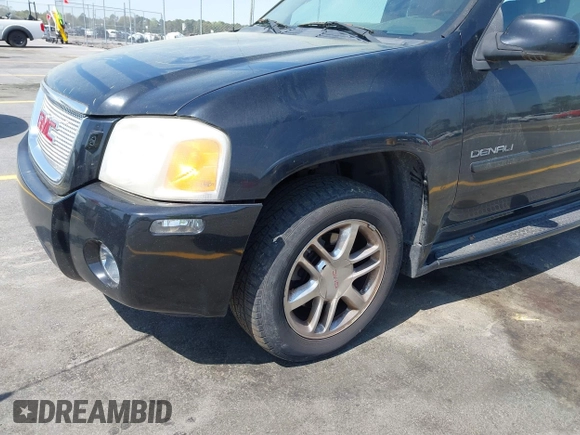 2007 GMC Envoy Denali with VIN 1GKES63MX72103849, listed as a IAAI auction lot 41904190 with 237,261 mi miles. Bid and sale history available at carsss.com. Image 15.