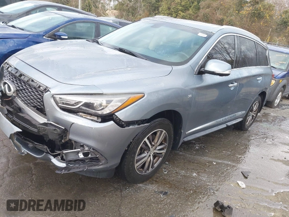 2016 Infiniti QX60 with VIN 5N1AL0MM9GC504320, listed as a IAAI auction lot 41290382 with 71,358 mi miles and . Bid and sale history available at DreamBid. Image 17.