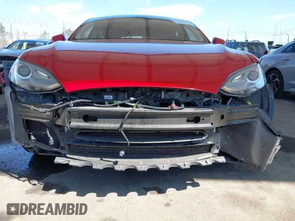 2013 Tesla Model S with VIN 5YJSA1DN8DFP25774, listed as a IAAI auction lot 41998095 with 135,671 mi miles and . Bid and sale history available at carsss.com. Image 6.