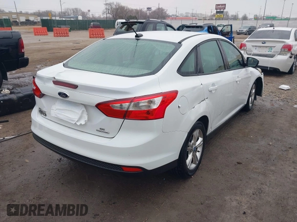 2013 Ford Focus SE with VIN 1FADP3F25DL221207, listed as a IAAI auction lot 41209646 with 160,125 mi miles and . Bid and sale history available at DreamBid. Image 4.