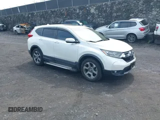 2018 Honda CR-V EX-L z VIN 2HKRW2H86JH607116, wystawiony jako IAAI lot #42466203 z przebiegiem 105 923 mil mil oraz . Historia ofert i sprzedaży dostępna na DreamBid. Obrazek 1.