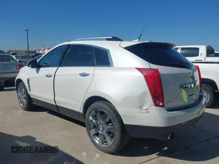 2011 Cadillac SRX Premium Collection z VIN 3GYFNCEYXBS579760, wystawiony jako IAAI lot #42238707 z przebiegiem Nie podano mil oraz . Historia ofert i sprzedaży dostępna na DreamBid. Obrazek 13.