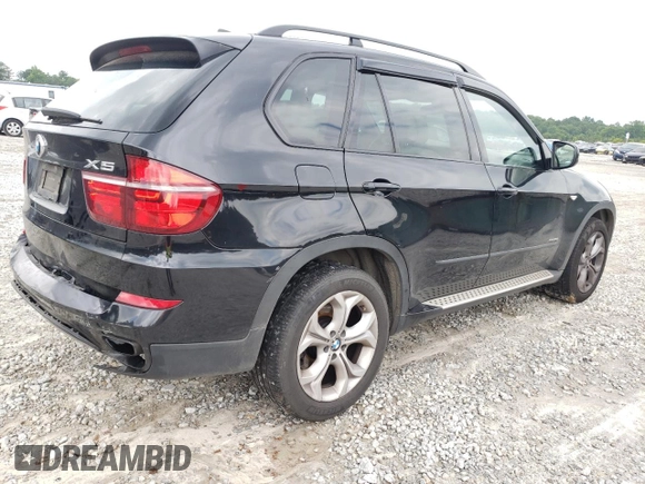 2011 BMW X5 50i with VIN 5UXZV8C52BL419028, listed as a Copart auction lot 59870505 with 126,666 mi miles and Salvage title. Bid and sale history available at DreamBid. Image 3.